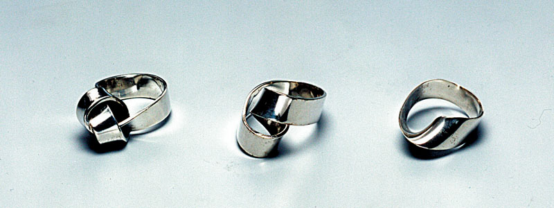 Knoop ring (62), Dubbele Lus ring (64) Lus ring (66)